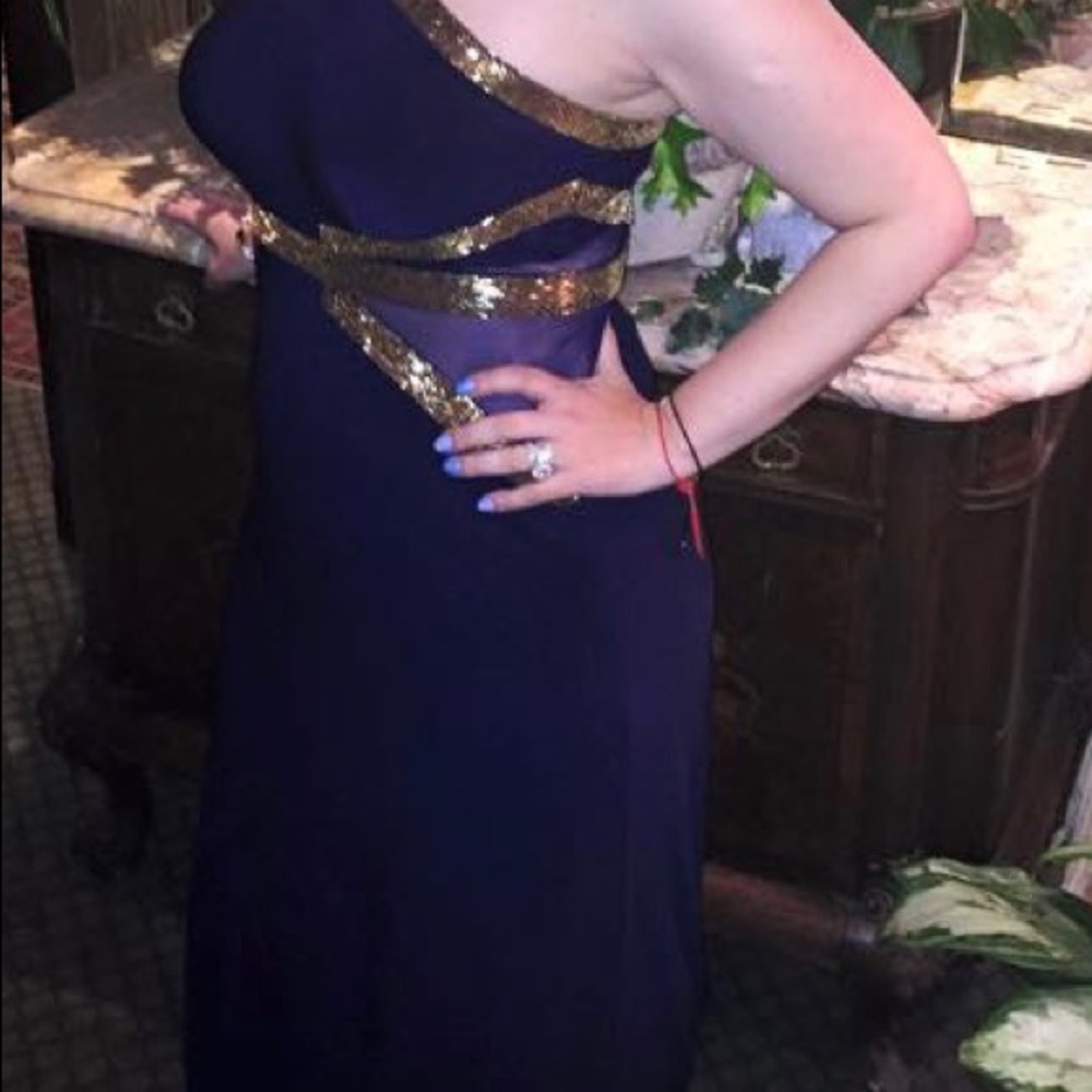 Navy blue floor length dress with gold accent
